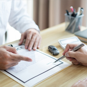 Worker's Compensation form being reviewed or signed after a claim denial.